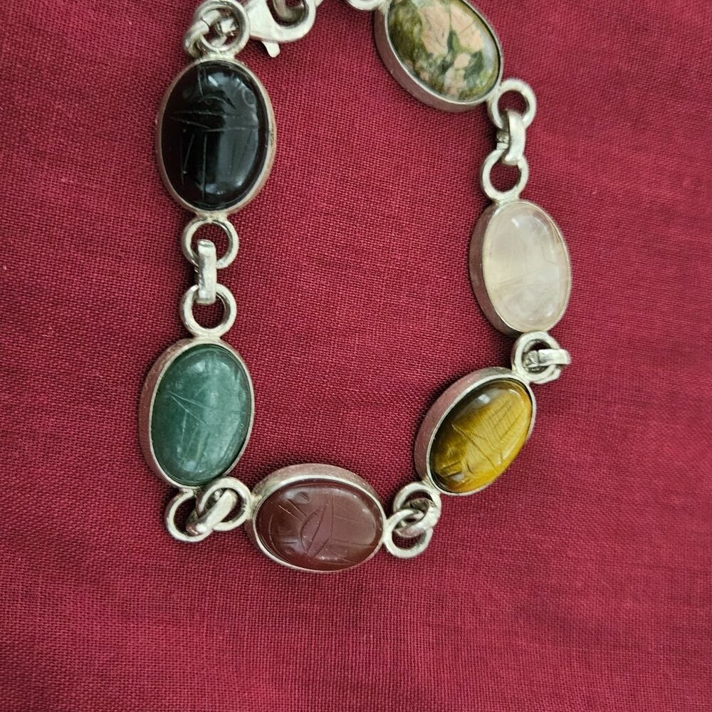 Sterling Silver bracelet, with scarab colored stones